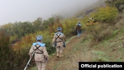 The HALO Trust-ի աշխատակիցները ականազերծման աշխատանքներ իրականացնելիս, արխիվ
