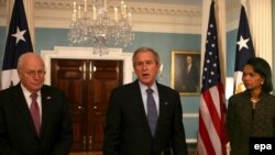 Is President Bush (center) surrounded by Russia-hawks?