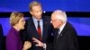 Senatorii democrați Elizabeth Warren și Bernie Sanders, doi candidați în cursa prezidențială