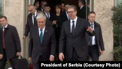 Kazakh President Qasym-Zhomart Toqaev (left) and Serbian President Aleksandar Vucic meet in Belgrade on November 19.