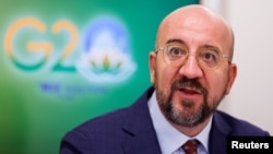 شارل میشل د هند په پلازمېنه نوي ډیلي کې د جي شل ډلې د سرمشریزې په درشل کې له خبریالانو سره د خبرو پر مهال.