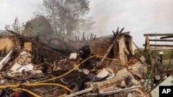 A house is destroyed after a Russian strike on a residential area in Ukraine's Kharkiv region (file photo)