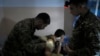 Azerbaijan Hands Over Bodies Of Armenian Soldiers Killed In Nagorno-Karabakh Fighting