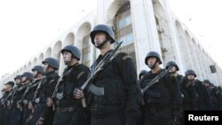 Kyrgyz security forces in Bishkek stand in formation during preparations for heightened security measures ahead of a presidential election in the Central Asian country in 2011. 