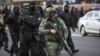 Belarus Forces Fire Tear Gas, Beat Demonstrators In Minsk As Tens Of Thousands Take To Streets