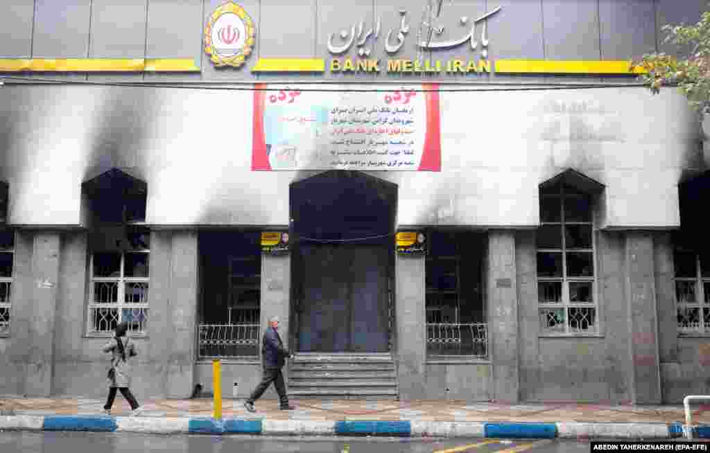 A branch of the Iranian national bank in Shahriar that was burned during the protests. Iran's government blamed the unrest on a "plot" from some of Tehran's foreign foes: Saudi Arabia, Israel, and the United States.