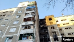 A view shows a damaged apartment building following what local authorities called a Ukrainian drone attack in Kursk, Russia, on April 15. 