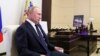 Putin Backs Minsk's Response To Protesters, Says Russian Troops Prepared To Deploy