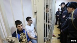 Defendants in the Bolotnaya case await their sentencing at a court hearing in Moscow on February 24.