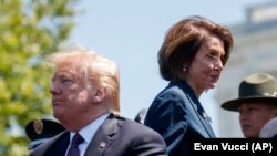 Președintele Statelor Unite, Donald Trump, și speakerul Camerei Reprezentanților, Nancy Pelosi. 15 mai 2019, Washington