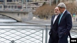 U.S. Secretary of State John Kerry (right) and Iranian Foreign Minister Mohammad Jawad Zarif held what were described as "substantive" talks on Tehran's disputed nuclear program.