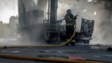 A firefighter at a gas station in Sumy, Ukraine, following a Russian attack on August 15 