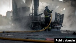 A firefighter at a gas station in Sumy, Ukraine, following a Russian attack on August 15 