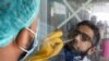 A paramedic performs a coronavirus test in Karachi. (file photo)