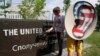 Activists from the Internet Party of Ukraine perform during a rally supporting Edward Snowden, a former contractor at the National Security Agency (NSA), in front of the U.S. Embassy in Kyiv on June 27.