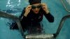 Female Iranian Athlete Bucking Official Tide Over 'Record' Swim