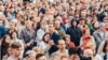 Belarus - A group of people is standing on the street of Minsk, 30Jun2018