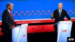 U.S. President Joe Biden (right) and former U.S. President and Republican presidential candidate Donald Trump participate in the first presidential debate of the 2024 elections at CNN's studios in Atlanta, Georgia, on June 27. 