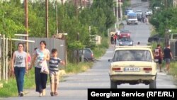 Life at the Tserovani IDP settlement, some 25 kilometers from Tbilisi, in August 2018