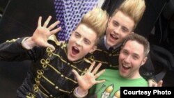 Jordan poses with the Irish duo Jedward at Eurovision 2011