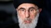 Former Afghan warlord Gulbuddin Hekmatyar speaks to the media after arriving to register as a candidate for the presidential election at the Independent Election Commission in Kabul on January 19.