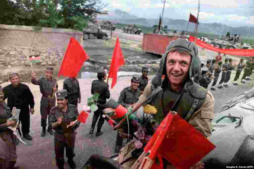 February 1989: After nine years of fighting to prop up a communist government in Kabul, the Soviet Army pulls out of Afghanistan. Despite a carefully stage-managed withdrawal, the flowers and applause cannot conceal the shock of defeat for the "invincible" Soviet Army. Around 15,000 Soviet troops had died in the conflict, along with more than 1 million Afghan civilians.