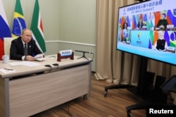 During his remarks at the summit, Russian President Vladimir Putin said that BRICS countries were “developing reliable alternative mechanisms for international settlements”