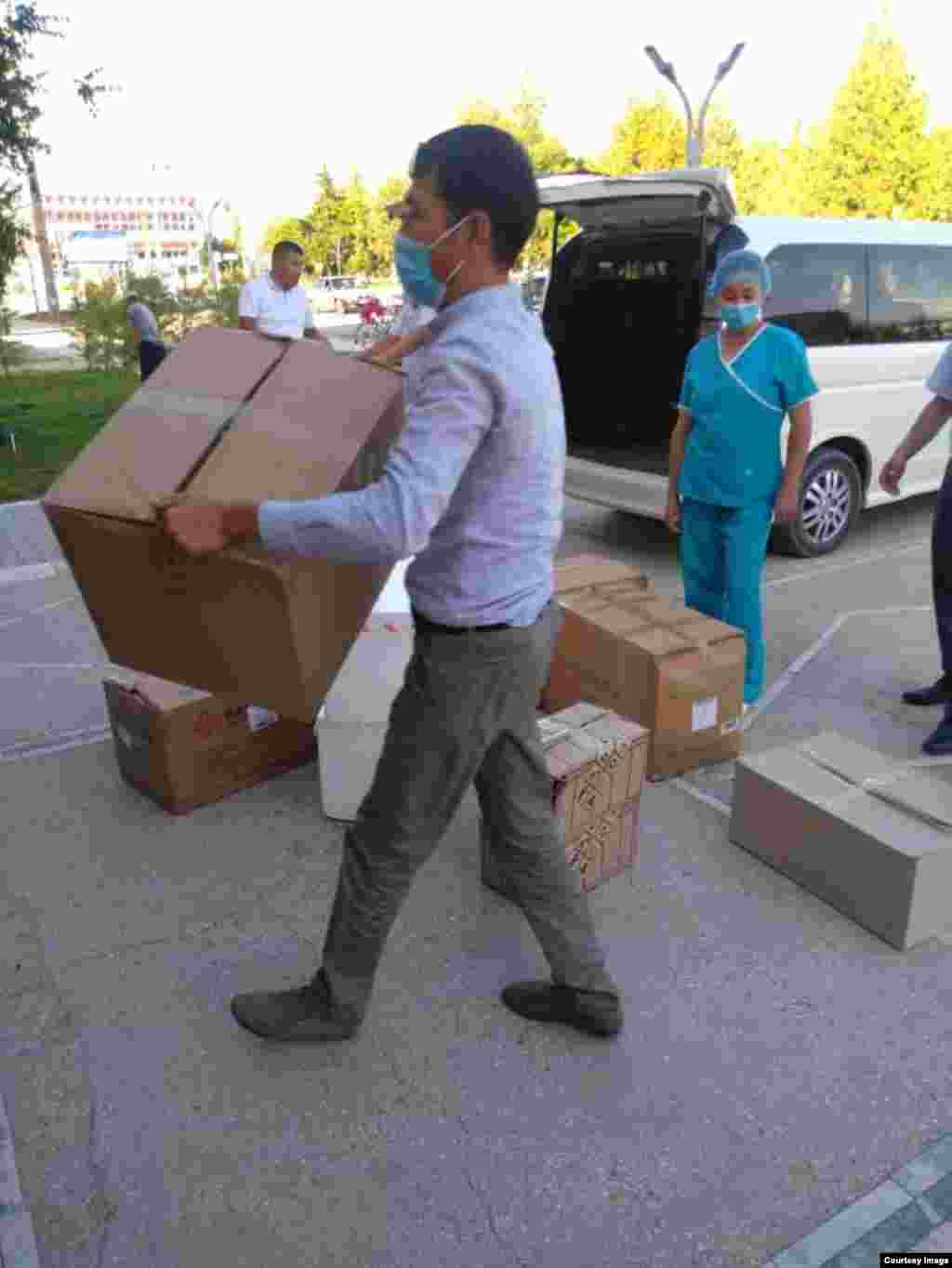 Neighboring Uzbekistan has donated protective gear and lab equipment to help Kyrgyzstan's Batken region deal with the rising number of COVID-19 cases.
