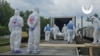Bodies of deceased soldiers are seen being returned to Ukraine on June 13.