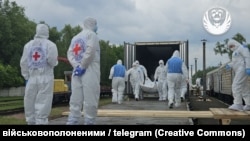 Bodies of deceased soldiers are seen being returned to Ukraine on June 13.