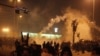 Демонстранттарга көздөн жаш агызчу газ атылды, Каир, 26-январь.