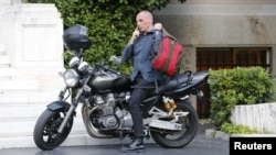 Greek Finance Minister Yanis Varoufakis arrives for a meeting at the office of the prime minister in Athens in July 2015.