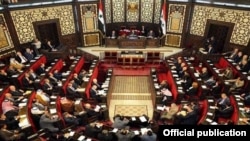 Syria - The Syrian parliament holds a special session dedicated to the centenary of the Armenian genocide, Damascus, 17Mar2015.