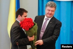 Президент Петро Порошенко і новопризначений міністр закордонних справ у Києві, 19 червня 2014 року