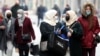 In The Balkans' Most Divided Country, COVID Vaccine Cuts Both Ways