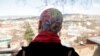 Georgia - Nano Mikautadze, 27, has alopecia and covered her head with a tattoo - screen grab
