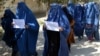 FILE: An Afghan women protest