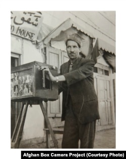 Kabul-based photographer Abdul Samad in the late 1950s with his box camera.