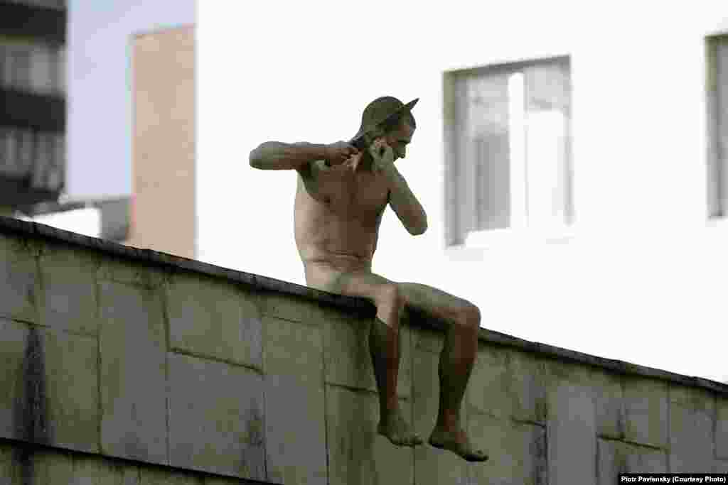 During his latest stunt on October 19, 2014, Pavlensky cuts off his earlobe to protest the forced use of psychiatric treatment against dissidents. 