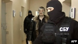 Украина --Путин Владимир вен кечлуш хилла аьлла лаьцна Осмаев Адам Одессерчу ницкъаллин урхаллан белхахойн каравахначу деношкахь, ГIуран-бутт, 2012