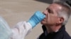 Spain - coronavirus test - COVID-19 - Reuters screen grab