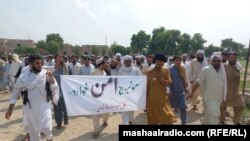 Local police demonstrate in the Lakki Marwat district of Khyber Pakhtunkhwa Province on September 9. 