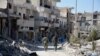 Într-un cartier distrus al localității Al-Raqqa în Siria