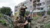 Акопы ў жылым раёне на тэрыторыі, падкантрольнай так званай «ЛНР». Ілюстрацыйнае фота