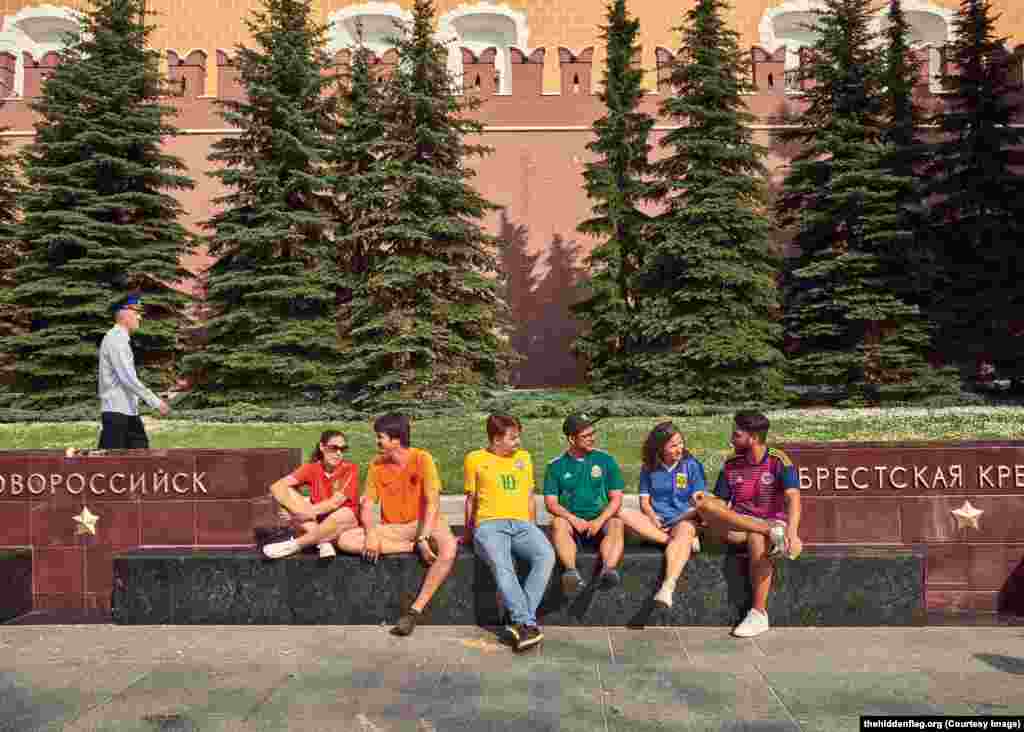 The activists sitting on a World War II memorial next to Moscow’s Kremlin.