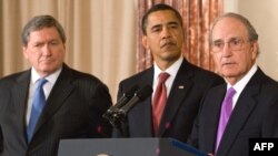 U.S. President Barack Obama (center) with Richard Holbrooke (left) and George Mitchell at the State Department on January 22