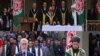 Președintele ales Mohammad Ashraf Ghani și principalul său rival, Abdullah Abdullah depun juramânt ca președinte al Afganistnului, 9 martie 2020. 