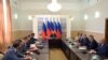 Владимир Путин на совещании с членами Совета безопасности в аннексированном Россией Крыму