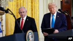 US President Donald Trump (right) and Israeli Prime Minister Benjamin Netanyahu at a February 4 news conference