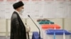 Iran's Supreme Leader Ayatollah Ali Khamenei speaks to reporters after casting his vote during the Iranian presidential election in Tehran in June 2021.